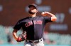 FILE - In this Aug. 29, 2019, file photo, Cleveland Indians relief pitcher Brad Hand throws during the ninth inning of a baseball game against the Detroit Tigers in Detroit. The Indians brought up highly touted reliever James Karinchak for their biggest series this season while they wait for All-Star closer Hand to get healthy. (AP Photo/Carlos Osorio, File)