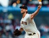 FILE - In this Sept. 9,2019, file photo, San Francisco Giants starting pitcher Madison Bumgarner throws against a Pittsburgh Pirates' batter in the second inning of a baseball game in San Francisco. Bumgarner has received a $17.8 million qualifying offer from the Giants, a move that likely will decrease demand for him in the free-agent market. (AP Photo/John Hefti, File)