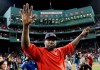 FILE - In this Oct. 10, 2016, file photo, Boston Red Sox's David Ortiz waves from the field at Fenway Park after Game 3 of baseball's American League Division Series against the Cleveland Indians in Boston. Officials say Ortiz, who was shot in the Dominican Republic on June 9, 2019, at an outdoor cafe, was the victim of incompetent criminals who were trying to kill a man next to him. (AP Photo/Charles Krupa, File)