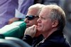 FILE - In this Aug. 23, 2019, file photo Pittsburgh Pirates general manager Neal Huntington, right, watches batting practice from the dugout before a baseball game against the Cincinnati Reds in Pittsburgh. The team said Monday, Oct. 28, 2019, that it has fired general manager Huntington, the third high-profile dismissal following a last-place finish in the NL Central. (AP Photo/Keith Srakocic, File)