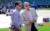 Fred Wilpon, right, majority owner of the New York Mets, and Mets COO Jeff Wilpon, left, watch the team warm up before a baseball game against the Atlanta Braves, Friday, June 28, 2019, in New York. (AP Photo/Frank Franklin II)