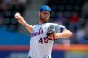 New York Mets starting pitcher Zack Wheeler throws a pitch to San Francisco Giants' Joe Panik during the first inning of a baseball game, Thursday, June 6, 2019, in New York. (AP Photo/Julio Cortez)