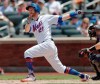 New York Mets Todd Frazier watches his three-run, home run during the first inning of a baseball game, Sunday, June 9, 2019, in New York. (AP Photo/Kathy Willens)
