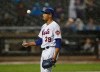New York Mets relief pitcher Edwin Diaz tosses the ball while waiting out a rain delay as groundskeepers prepped the field during the ninth inning of the team's baseball game against the St. Louis Cardinals on Thursday, June 13, 2019, in New York. (AP Photo/Kathy Willens)