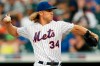 New York Mets starting pitcher Noah Syndergaard winds up during the first inning of a baseball game against the Atlanta Braves, Sunday, June 30, 2019, in New York. (AP Photo/Kathy Willens)