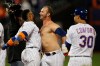 New York Mets' Pete Alonso, center, celebrates after being walked with the bases loaded for the win against the Philadelphia Phillies in the ninth inning of their baseball game Friday, Sept. 6, 2019, in New York. (AP Photo/Mary Altaffer)
