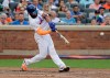 New York Mets' Amed Rosario hits a double during the fourth inning of the team's baseball game against the Atlanta Braves on Saturday, June 29, 2019, in New York. (AP Photo/Frank Franklin II)