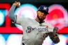 FILE -In this May 27, 2019 file photo Milwaukee Brewers relief pitcher Jeremy Jeffress throws against the Minnesota Twins in the fifth inning of a baseball game in Minneapolis. Milwaukee has designated Jeremy Jeffress for assignment after the reliever played a key role in the Brewers' run to the NL Championship Series last year. (AP Photo/Jim Mone, file)