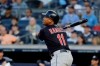 Cleveland Indians' Jose Ramirez watches his grand slam during the first inning of the team's baseball game against the New York Yankees on Thursday, Aug. 15, 2019, in New York. (AP Photo/Frank Franklin II)