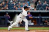 New York Yankees designated hitter Edwin Encarnacion watches his third-inning grand slam during the team's baseball game against the Colorado Rockies, Friday, July 19, 2019, in New York. (AP Photo/Kathy Willens)