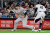REMOVES REFERENCE TO SINGLE FOR GREGORIUS - New York Yankees' Didi Gregorius (18) beats the throw to first base as Oakland Athletics' Brett Anderson catches the ball, after Gleyber Torres was forced out at second during the third inning of a baseball game Friday, Aug. 30, 2019, in New York. (AP Photo/Frank Franklin II)