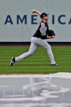 New York Yankees starting pitcher James Paxton throws in a light drizzle while the tarp is on the field at Yankee Stadium, Thursday, Oct. 3, 2019, in New York. The Yankees will host the Minnesota Twins in the first game of an American League Division Series on Friday. (AP Photo/Seth Wenig)