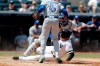 Toronto Blue Jays starting pitcher Marcus Stroman, left, watches as Blue Jays' catcher Danny Jansen, right, watch as New York Yankees' Gio Urshela, center, slides into home plate trying to score on a wild pitch during the fifth inning of a baseball game, Sunday, July 14, 2019, in New York. The play was video reviewed and Urshela was ruled safe after New York Yankees manager Aaron Boone challenged the call on the field. (AP Photo/Kathy Willens)