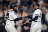 New York Yankees catcher Gary Sanchez, left, and relief pitcher Aroldis Chapman congratulate on another after the Yankees defeated the Boston Red Sox 4-1 during a baseball game Friday, May 31, 2019, in New York. (AP Photo/Julio Cortez)