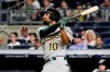 Oakland Athletics' Marcus Semien watches his home run during the ninth inning of the team's baseball game against the New York Yankees on Friday, Aug. 30, 2019, in New York. The Athletics won 8-2. (AP Photo/Frank Franklin II)