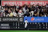 New York Yankees right fielder Aaron Judge watches as fans attempt to catch a ball hit by Cleveland Indians' Carlos Santana for a two-run home run during the fourth inning of a baseball game Thursday, Aug. 15, 2019, in New York. (AP Photo/Frank Franklin II)