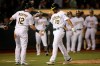 Oakland Athletics' Marcus Semien, right, is congratulated by Sean Murphy (12) after hitting a two-run home run against the Kansas City Royals in the second inning of a baseball game Monday, Sept. 16, 2019, in Oakland, Calif. (AP Photo/Ben Margot)