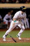 Oakland Athletics' Seth Brown drops his bat after hitting an RBI double off Kansas City Royals' Jorge Lopez during the seventh inning of a baseball game Tuesday, Sept. 17, 2019, in Oakland, Calif. (AP Photo/Ben Margot)