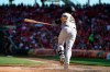 San Francisco Giants' Buster Posey watches his three-run home run in the sixth inning of a baseball game against the Cincinnati Reds, Sunday, May 5, 2019, in Cincinnati. (AP Photo/Aaron Doster)