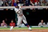 National League's Pete Alonso, of the New York Mets, hits a two run single during the eighth inning of the MLB baseball All-Star Game against the American League, Tuesday, July 9, 2019, in Cleveland. (AP Photo/Tony Dejak)