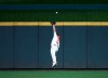 A double by Philadelphia Phillies' Jean Segura gets over the head of Cincinnati Reds center fielder Nick Senzel during the fourth inning of a baseball game Tuesday, Sept. 3, 2019, in Cincinnati. (AP Photo/Gary Landers)
