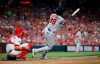 St. Louis Cardinals' Jose Martinez follows through on a three-run home run off Cincinnati Reds relief pitcher Jared Hughes during the sixth inning of a baseball game Friday, July 19, 2019, in Cincinnati. (AP Photo/Gary Landers)