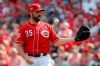 Cincinnati Reds starting pitcher Tanner Roark reacts after giving up a three-run home run to Washington Nationals' Gerardo Parra in the second inning of a baseball game, Saturday, June 1, 2019, in Cincinnati. (AP Photo/John Minchillo)