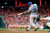 Los Angeles Dodgers' Cody Bellinger hits a solo home run off Cincinnati Reds relief pitcher Zach Duke in the eighth inning of a baseball game, Friday, May 17, 2019, in Cincinnati. (AP Photo/John Minchillo)