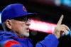Chicago Cubs manager Joe Maddon gestures in the dugout in the sixth inning of the team's baseball game against the Cincinnati Reds, Thursday, May 16, 2019, in Cincinnati. (AP Photo/John Minchillo)