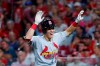 St. Louis Cardinals' Tommy Edman celebrates after hitting a grand slam off Cincinnati Reds relief pitcher Robert Stephenson during the sixth inning of a baseball game Thursday, July 18, 2019, in Cincinnati. (AP Photo/John Minchillo)