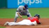 Cleveland Indians' Jordan Luplow, right, steals second base as Tampa Bay Rays' Brandon Lowe is late with the tag during the second inning of a baseball game Friday, May 24, 2019, in Cleveland. (AP Photo/Tony Dejak)
