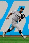 Chicago White Sox's Eloy Jimenez catches a ball hit by Cleveland Indians' Jordan Luplow in the third inning in a baseball game Monday, Sept. 2, 2019, in Cleveland. Luplow was out on the play. (AP Photo/Tony Dejak)