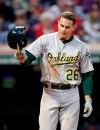 Oakland Athletics' Matt Chapman throws his helmet after striking out against Cleveland Indians starting pitcher Trevor Bauer in the sixth inning of a baseball game, Tuesday, May 21, 2019, in Cleveland. (AP Photo/Tony Dejak)
