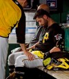 Pittsburgh Pirates catcher Francisco Cervelli is consoled by hitting coach Rick Eckstein, left, after taking himself out of a baseball game against the Los Angeles Dodgers during the fourth inning in Pittsburgh, Saturday, May 25, 2019. Cervelli had been hit in the head by a foul tip in the top of the inning. (AP Photo/Gene J. Puskar)