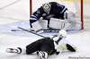 John Woods / The Canadian Press
Penguins forward Evgeni Malkin gets a shot off while on his belly, but Jets goalie Ondrej Pavelec is equal to the task.