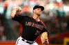 Arizona Diamondbacks starting pitcher Merrill Kelly throws a pitch against the Cincinnati Reds during the first inning of a baseball game, Saturday, Sept. 14, 2019, in Phoenix. (AP Photo/Ross D. Franklin)