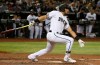 Arizona Diamondbacks' David Peralta watches his RBI triple against the Atlanta Braves during the sixth inning of a baseball game Friday, May 10, 2019, in Phoenix. (AP Photo/Ross D. Franklin)