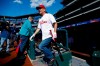 Actor Bruce Willis walks out of the Philadelphia Phillies' dugout to take batting practice before a baseball game against the Milwaukee Brewers, Wednesday, May 15, 2019, in Philadelphia. (AP Photo/Matt Slocum)