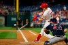 Philadelphia Phillies' Corey Dickerson hits a two-run home run off Atlanta Braves starting pitcher Max Fried during the first inning of a baseball game, Tuesday, Sept. 10, 2019, in Philadelphia. (AP Photo/Matt Slocum)