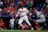 Philadelphia Phillies' Andrew McCutchen follows the flight of the ball after hitting a home run with one run batted in off of St. Louis Cardinals pitcher Michael Wacha during the fifth inning of a baseball game, Wednesday, May 29, 2019, in Philadelphia. (AP Photo/Matt Rourke)