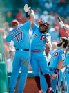 Philadelphia Phillies' Maikel Franco (7) and Rhys Hoskins (17) celebrate after Franco hit a two-run home run off New York Mets relief pitcher Edwin Diaz during the ninth inning of a baseball game, Thursday, June 27, 2019, in Philadelphia. Philadelphia won 6-3. (AP Photo/Matt Slocum)