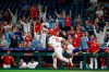 Philadelphia Phillies' Sean Rodriguez rounds the bases after hitting a winning home run off Pittsburgh Pirates relief pitcher Michael Feliz during the 11th inning of a baseball game, Monday, Aug. 26, 2019, in Philadelphia. (AP Photo/Matt Slocum)