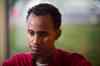 Yahya Samatar at the Welcome Place in Winnipeg on Wednesday, Aug. 12, 2015. Samatar has spent much of the last few days filling out many complex documents with help from staff. (Mikaela MacKenzie / Winnipeg Free Press)