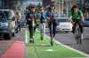 People ride LimeBike and Bird Rides shared electric scooters in San Francisco. (Bloomberg photo by David Paul Morris)