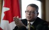 Vice Admiral Mark Norman reacts during a press conference in Ottawa on Wednesday, May 8, 2019. The charges against Norman were dropped. THE CANADIAN PRESS/Sean Kilpatrick