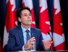 Dr. Eric Hoskins, Chair of the Advisory Council on the Implementation of National Pharmacare, speaks during a press conference at the National Press Theatre in Ottawa on Wednesday, June 12, 2019. THE CANADIAN PRESS/Sean Kilpatrick