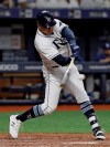 Tampa Bay Rays' Avisail Garcia connects for a three-run home run off Los Angeles Dodgers relief pitcher Dylan Floro during the seventh inning of a baseball game Wednesday, May 22, 2019, in St. Petersburg, Fla. (AP Photo/Chris O'Meara)