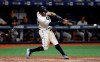 Tampa Bay Rays' Tommy Pham lines a walkoff RBI-single off Baltimore Orioles relief pitcher Dillon Tate during the 10th inning of a baseball game Monday, Sept. 2, 2019, in St. Petersburg, Fla. Rays' Joey Wendle scored. (AP Photo/Chris O'Meara)