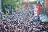 MIKAELA MACKENZIE / WINNIPEG FREE PRESS

Jets fans arrive at Donald Street for the whiteout street party in Winnipeg on Monday, May 7, 2018. 

Mikaela MacKenzie / Winnipeg Free Press 2018.