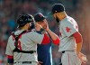 Boston Red Sox manager Alex Cora, center, talks with starting pitcher David Price, right, as catcher Sandy Leon (3) joins them on the mound during the first inning of a baseball game against the Houston Astros Saturday, May 25, 2019, in Houston. Price left the game after their discussion. (AP Photo/David J. Phillip)